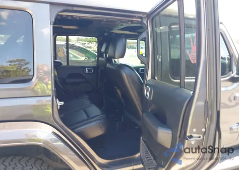 2020 Jeep Wrangler Unlimited Sahara from USA, damaged, VIN 1C4HJXEN2LW325103